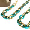 21287 Xl brilketting grote schakel - acetaat - turkoois met goud met bril
